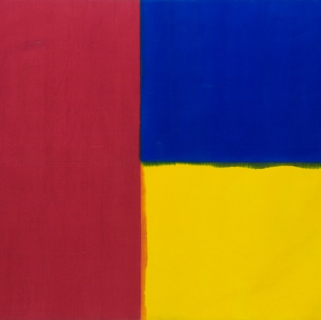 An abstract, geometric image consisting of three multi-colored surfaces.