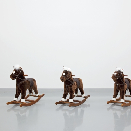 Artwork, three rocking horses